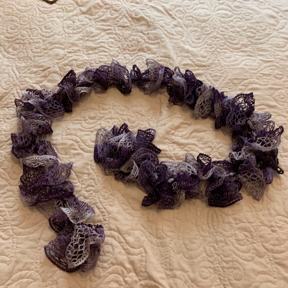 Purple hand-knitted scarf